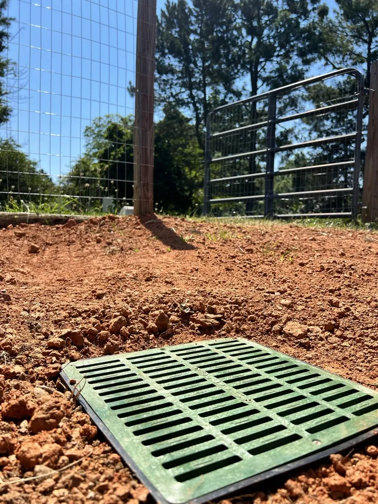 Grading Piedmont red clay soil in North Carolina